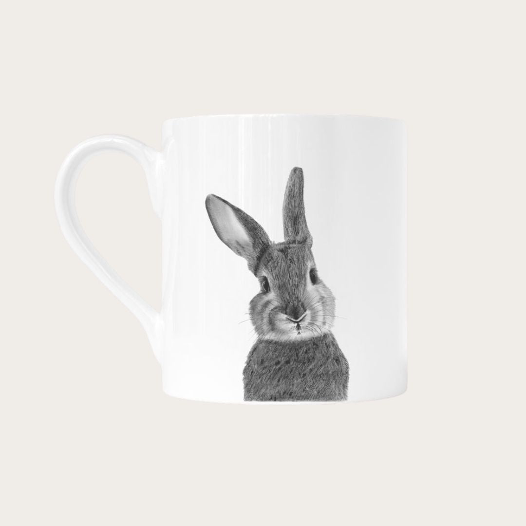 Cute rabbit design on a white bone china mug, ideal for animal lovers.