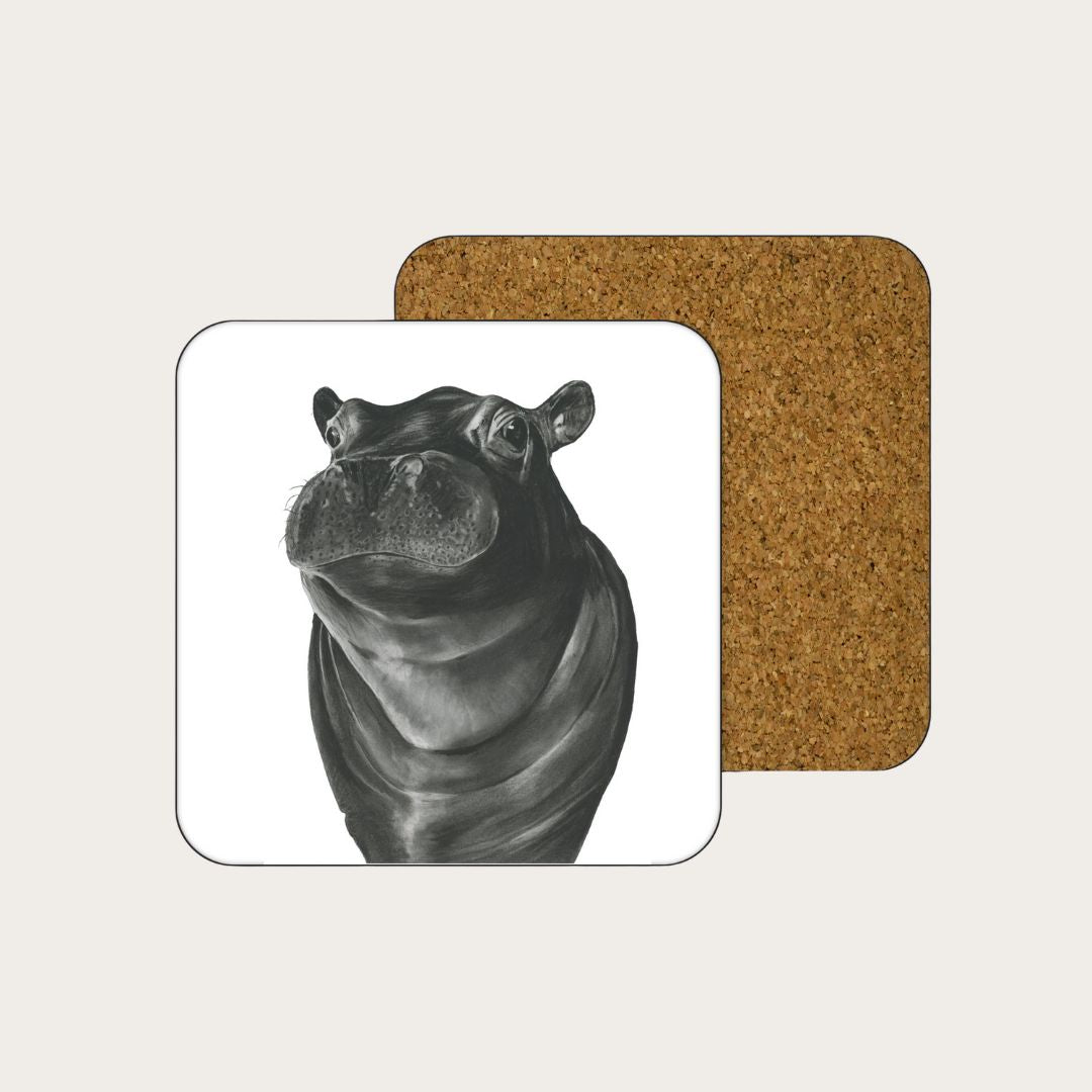 A high-quality coaster featuring a detailed hand-drawn illustration of Carina the Hippo, adding a touch of wildlife charm to your home decor. Crafted from durable materials, this coaster protects your surfaces while showcasing your appreciation for animal artistry. An ideal gift for wildlife enthusiasts and collectors.