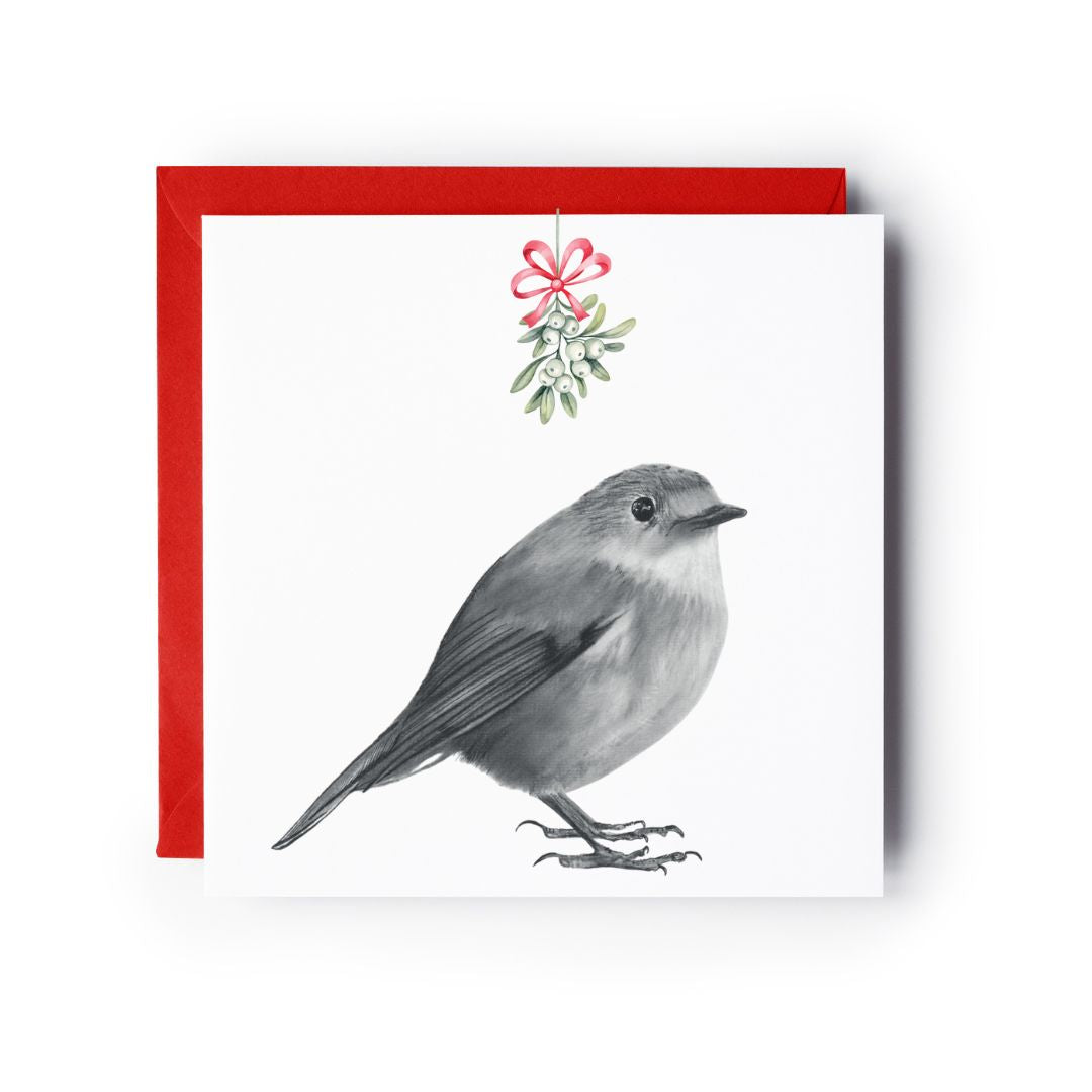 A cute robin with mistletoe above, bringing Christmas cheer in this delightful holiday greeting card