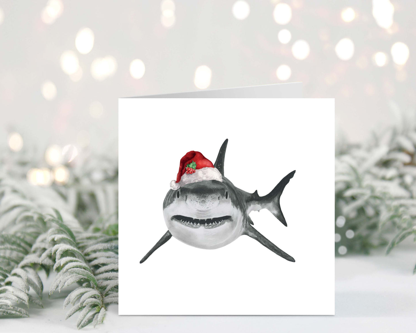 Vega the shark in a Santa hat, cheerful and fun holiday greeting card.