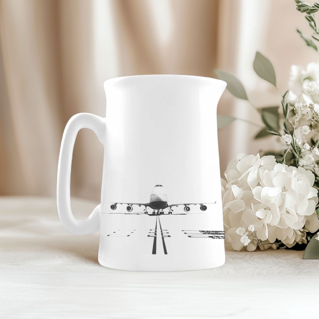 Stylish jug featuring a 747 plane illustration, ideal aviation-themed gift.