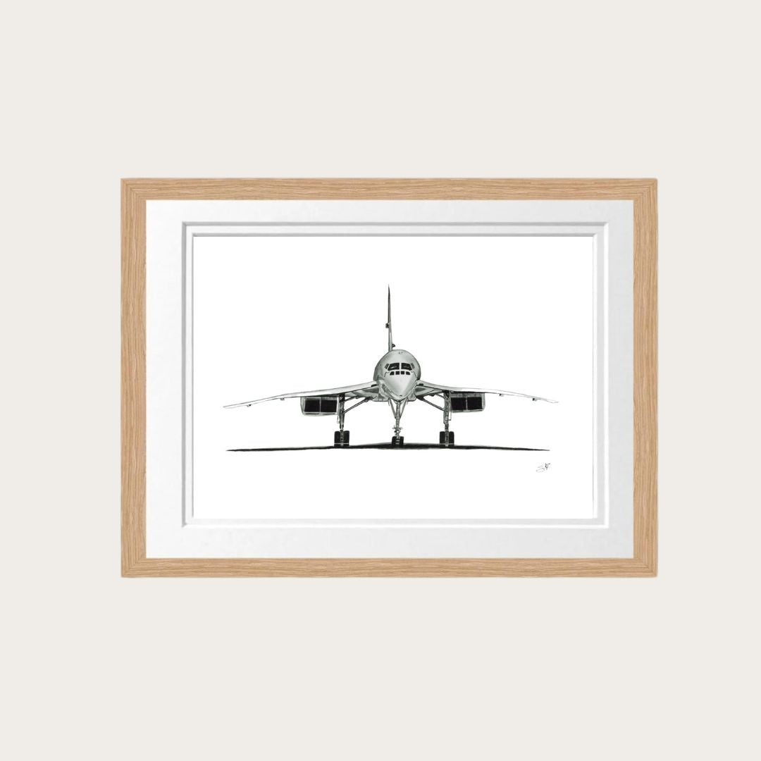 An exquisite hand-drawn limited edition signed art print of the Concorde aircraft, framed in a handcrafted oak frame. This artwork captures the elegance and legacy of the world's most iconic supersonic airliner. Ideal for aviation aficionados and as a distinguished addition to any collection. Available exclusively at LIBRA FINE ARTS.