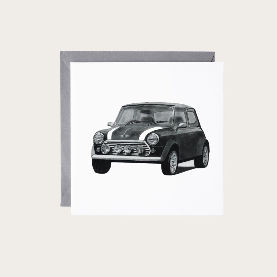 An elegant greeting card showcasing a detailed hand-drawn image of a Mini Cooper, ideal for celebrating special occasions with a touch of classic automotive charm. Crafted from premium, sustainable materials, it comes with a coordinating envelope and offers a blank interior for your heartfelt notes. Find it at Libra Fine Arts.