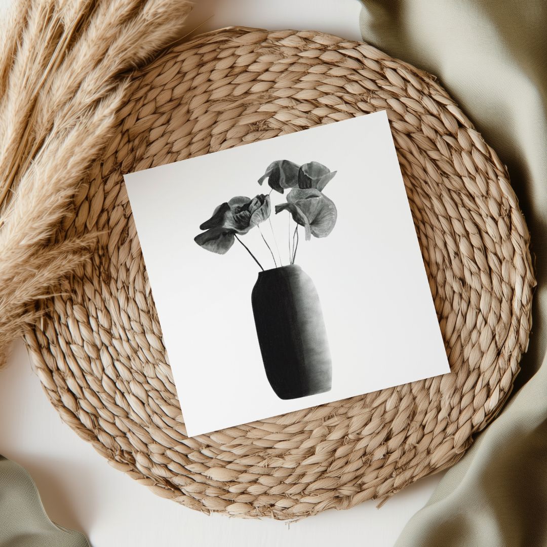 An exquisite greeting card showcasing a detailed hand-drawn illustration of poppy flowers, ideal for celebrating special occasions or sending heartfelt messages. The inside is blank for your personal note, and it includes a coordinating envelope. Made with premium, sustainable materials