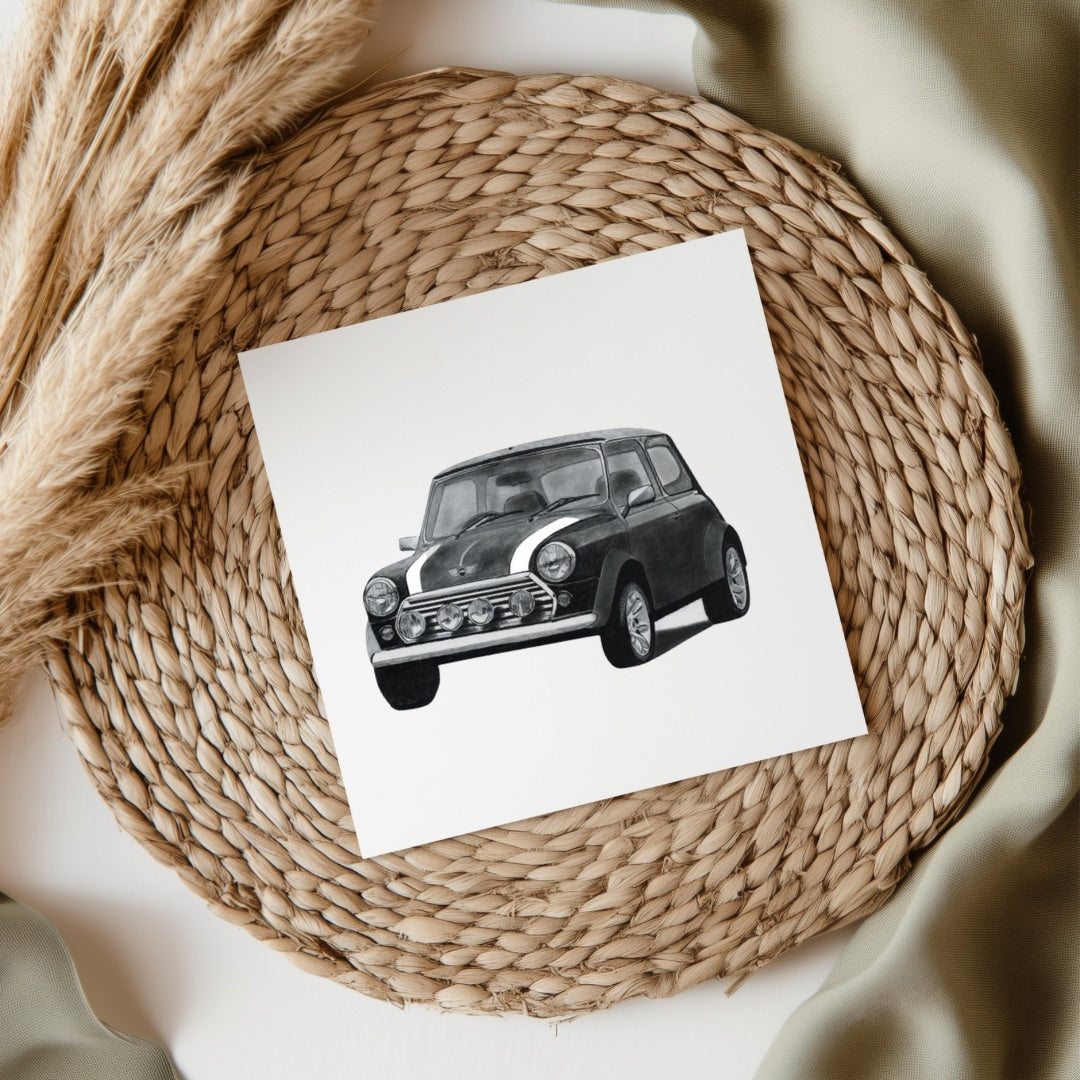 A charming greeting card featuring a hand-drawn illustration of a classic Mini Cooper, evoking a sense of nostalgia and warmth. Perfect for vintage car enthusiasts, this card is printed on high-quality, eco-friendly cardstock and includes a matching envelope. The interior is left blank for your personal message. Available at Libra Fine Arts.