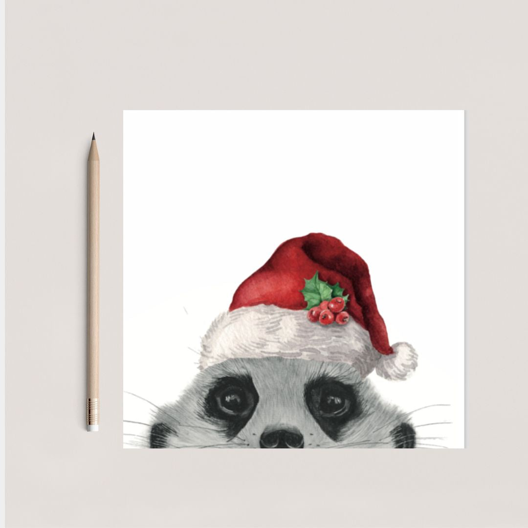 Hand-drawn Christmas card of Myra the meerkat peeking while wearing a festive Santa hat