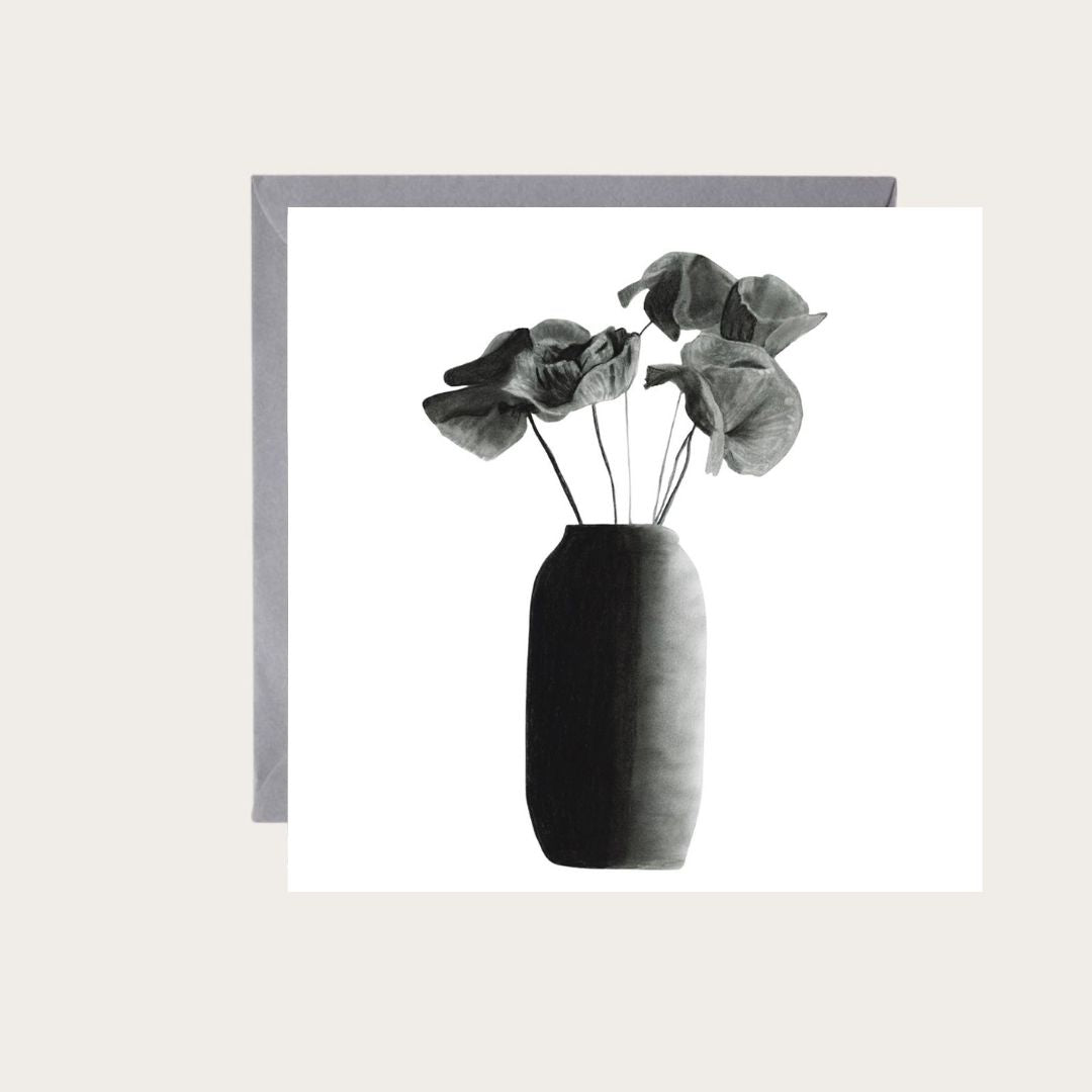 A beautifully hand-drawn greeting card featuring vibrant poppy flowers, perfect for expressing sentiments on birthdays, anniversaries, or as a thoughtful note. The card is blank inside, allowing for personalized messages, and comes with a matching envelope. Printed on high-quality, eco-friendly paper.