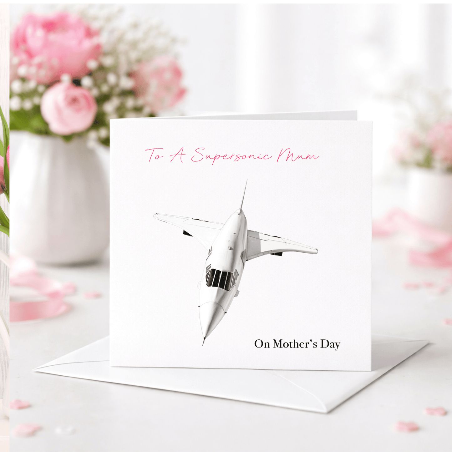 Greeting card with airplane illustration and text on a floral background