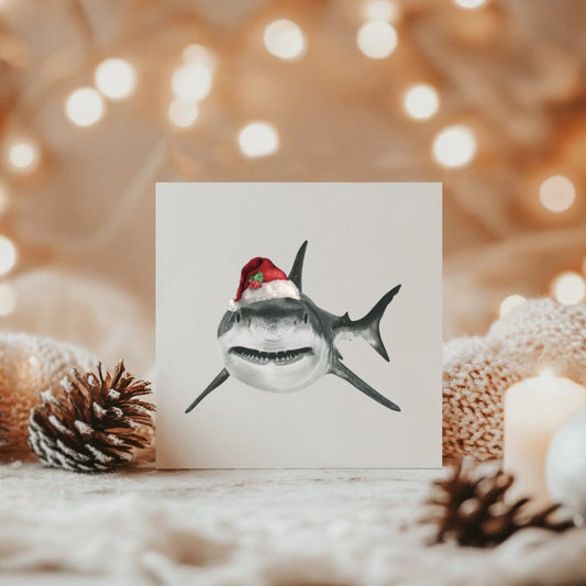 Hand-drawn shark wearing a Santa hat, festive Christmas card design.