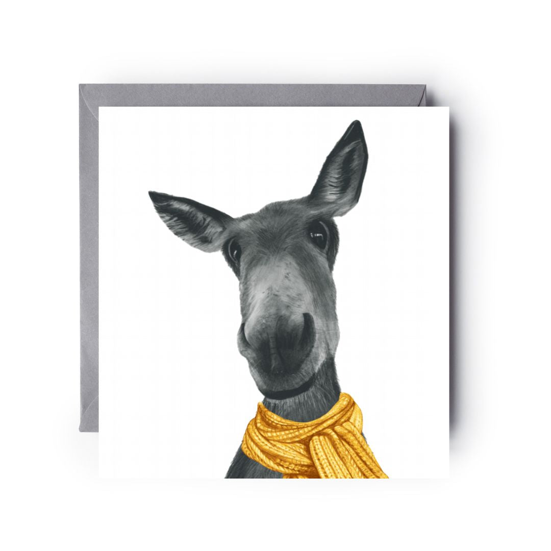 Hand-drawn winter greeting card with an adorable donkey wearing a cosy scarf.