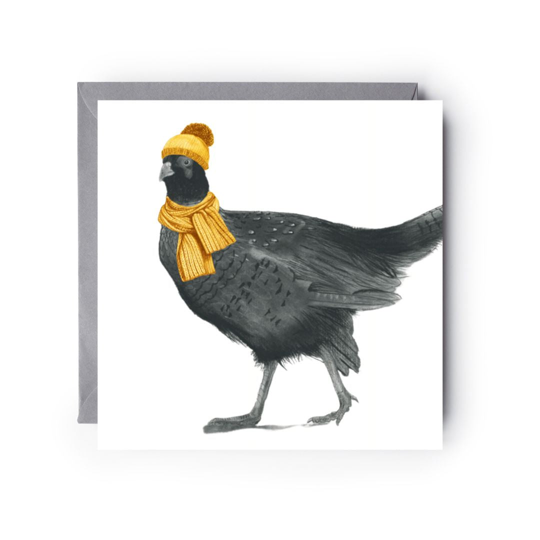 Hand-drawn winter greeting card featuring a beautiful pheasant wearing a cozy scarf.