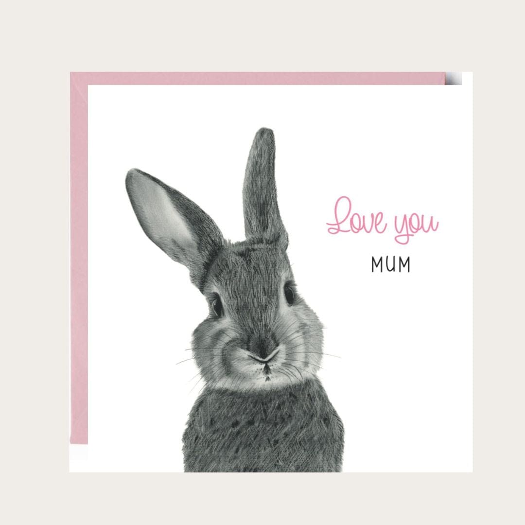A hand-drawn 'Love You Mum' bunny greeting card, displayed with a pink envelope. Perfect for Mother's Day, birthdays, or just to show appreciation, this charming card features an adorable bunny design. Printed on high-quality cardstock with a blank interior, ready for your personal message.