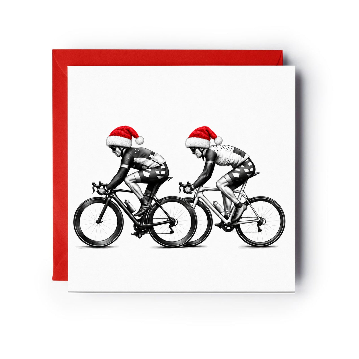 Two road cyclists wearing red Santa hats on a Christmas card with a red envelope