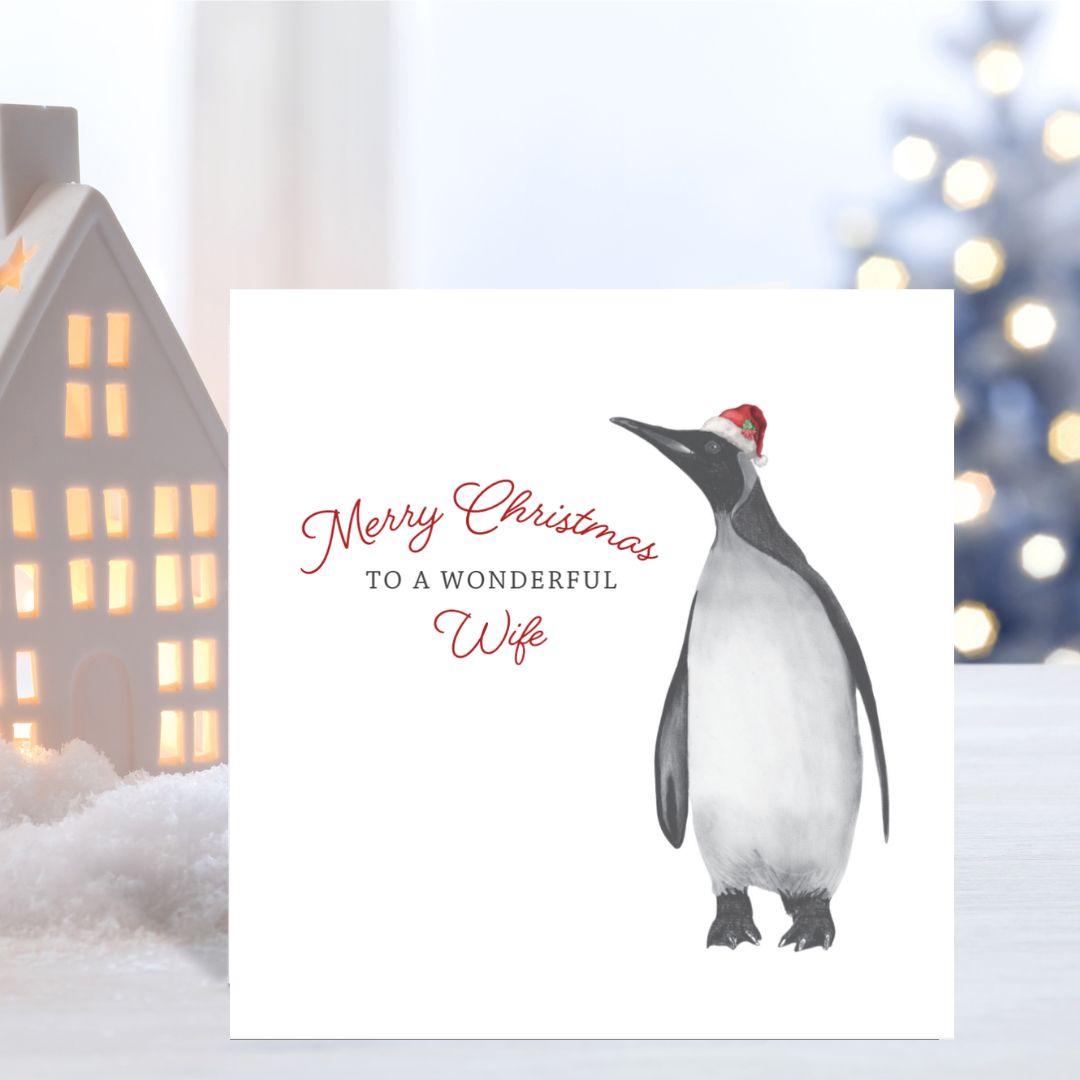 A beautifully hand-drawn festive penguin Christmas card for your wonderful wife, created by Libra Fine Arts