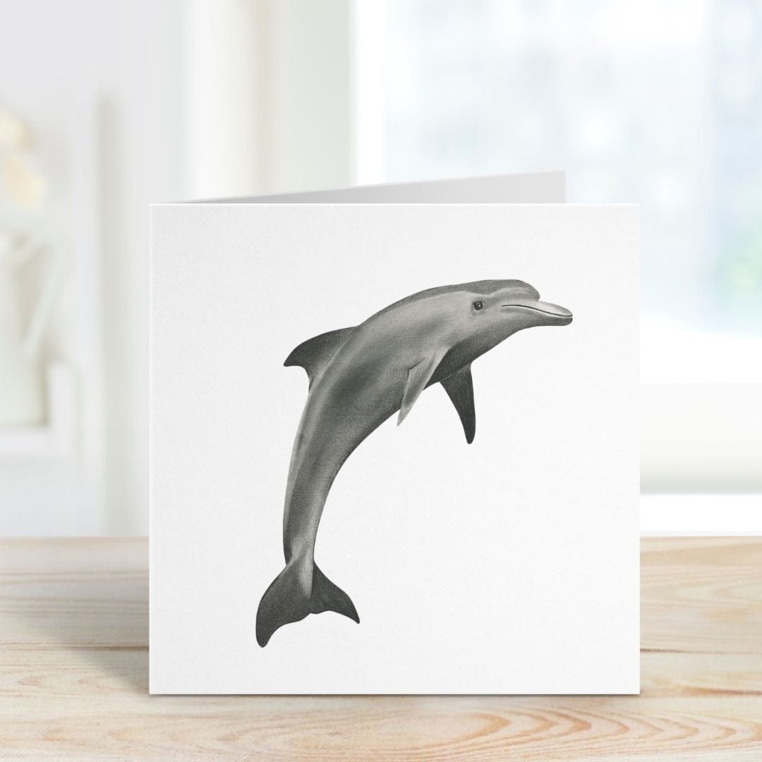 A standing hand-drawn Dolphin Greeting Card from Libra Fine Arts, beautifully displayed, perfect for ocean and wildlife enthusiasts.