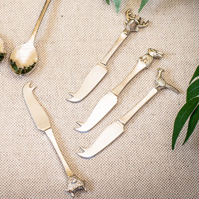 A set of 4 mini cheese knives from the Country Animals collection, each featuring a unique animal design on the handle, including a stag, pheasant, rabbit, and Highland cow. These beautifully crafted knives are perfect for serving cheese with a rustic, countryside charm.