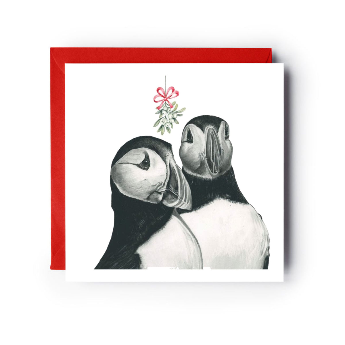 Puffin Mistletoe Kisses Christmas Card — card with red envelope