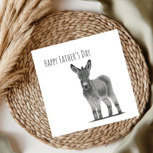 Adorable hand-drawn donkey Father's Day card featuring a cute little donkey, ideal for country-loving dads and animal fans.