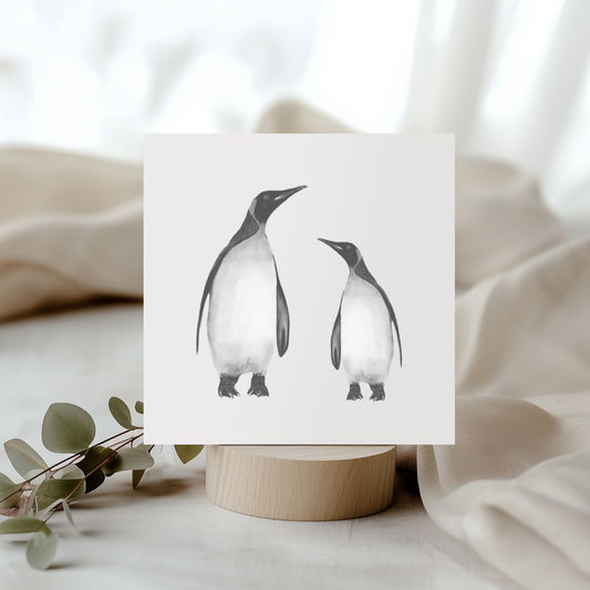 Charming hand-illustrated greeting card featuring Alya and her baby penguin, perfect for sending warm wishes to animal lovers and fans of adorable wildlife scenes.