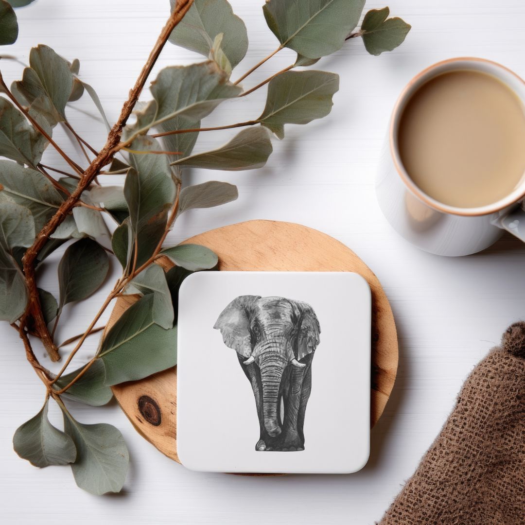 A high-quality coaster featuring a detailed hand-drawn illustration of Atik the Elephant, adding a touch of wildlife charm to your home decor. Crafted from durable materials, this coaster protects your surfaces while showcasing your appreciation for animal artistry. An ideal gift for wildlife enthusiasts and collectors.