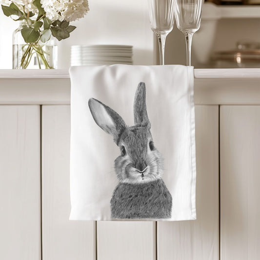 Premium cotton tea towel featuring Bellatrix the Bunny, a charming and whimsical design perfect for animal lovers. A beautiful addition to any kitchen.








