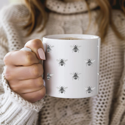 This beautiful Busy Bees Bone China Mug features a hand-illustrated design of buzzing bees, perfect for nature lovers and tea enthusiasts. With its delicate bone china construction, this mug offers both elegance and charm, making it a lovely addition to your kitchen or a thoughtful gift for bee lovers