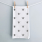 Premium cotton tea towel with a charming busy bee design, adding a cheerful touch to your kitchen. Perfect for bee lovers and nature-inspired home decor.