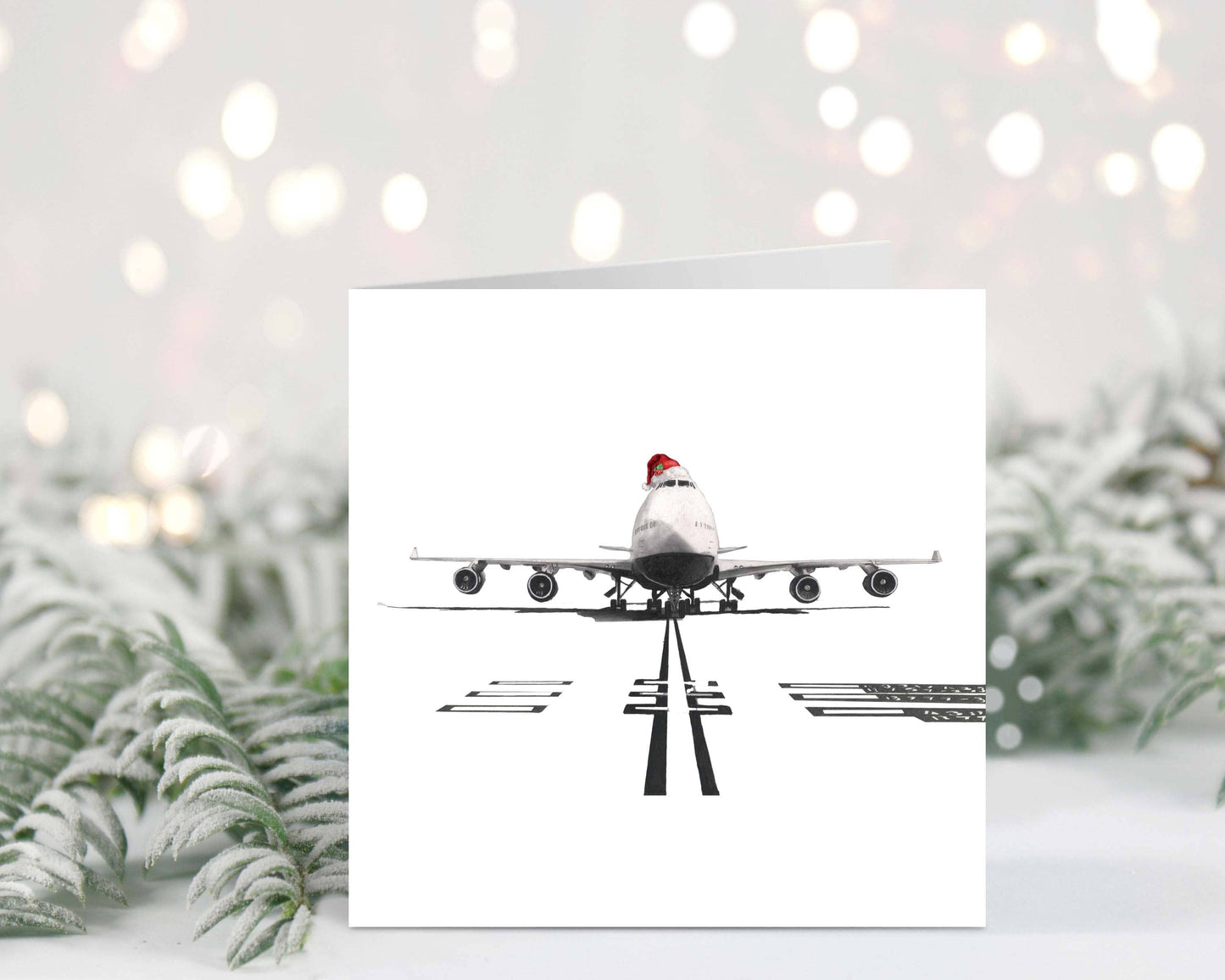 Illustrated 747 airplane with holiday decorations, perfect for aviation lovers at Christmas