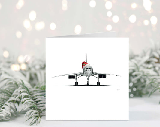 Christmas card featuring the Concorde jet in a Santa hat, celebrating the holiday season.