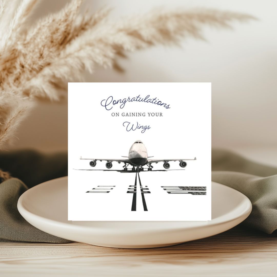This aviation-inspired 'Congratulations on Gaining Your Wings' greeting card showcases a beautifully hand-drawn 747 aircraft. Perfect for congratulating someone on their flight milestone or aviation achievement."

