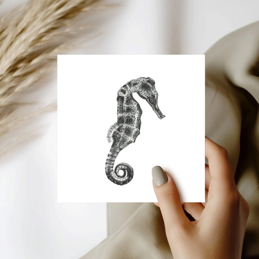 A beautifully hand-drawn greeting card featuring Diya the seahorse.This ocean-inspired design captures the delicate beauty of marine life, making it a perfect choice for ocean enthusiasts and nature lovers. Ideal for birthdays, anniversaries, or any special occasio