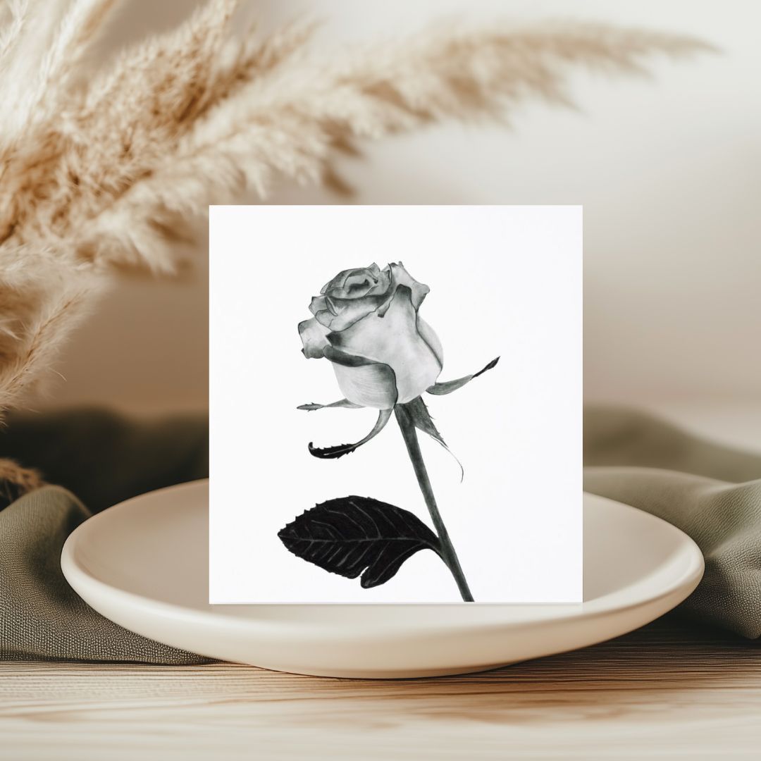 A beautifully hand-illustrated greeting card featuring an English rose, perfect for expressing sentiments on various occasions. Printed on high-quality, eco-friendly cardstock, it includes a matching envelope and is left blank inside for your personal message. Available at Libra Fine Arts.