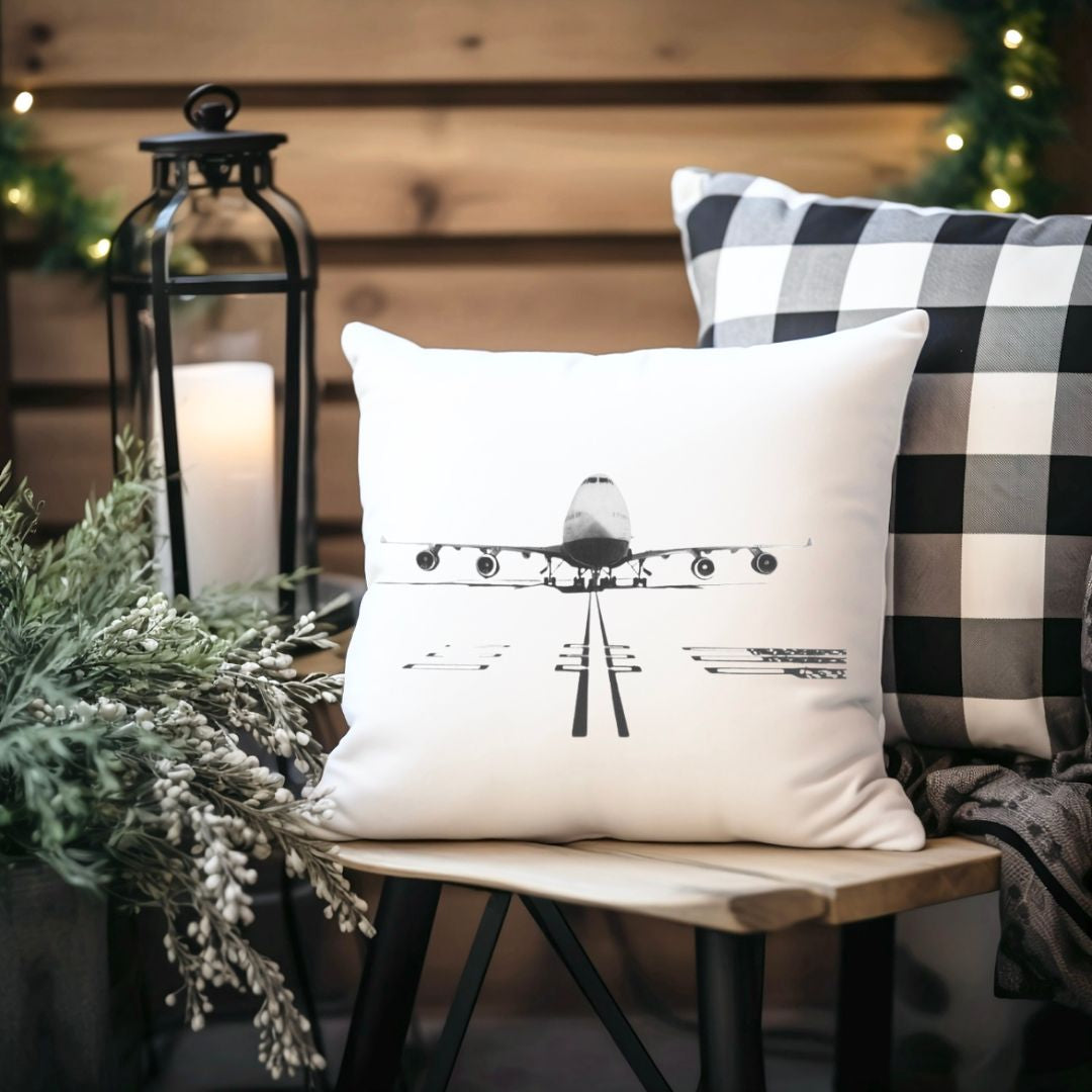 A soft faux suede cushion featuring a detailed hand-drawn Boeing 747 aircraft illustration, perfect for aviation lovers and stylish home décor.