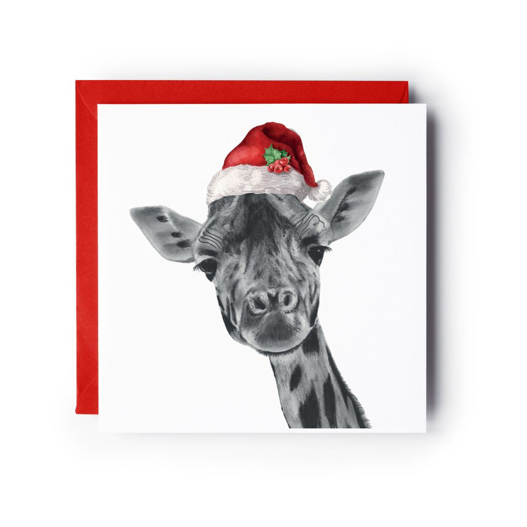 Charming hand-drawn Christmas card featuring Maya the giraffe in a Santa hat, an ideal design for spreading festive cheer to loved ones.