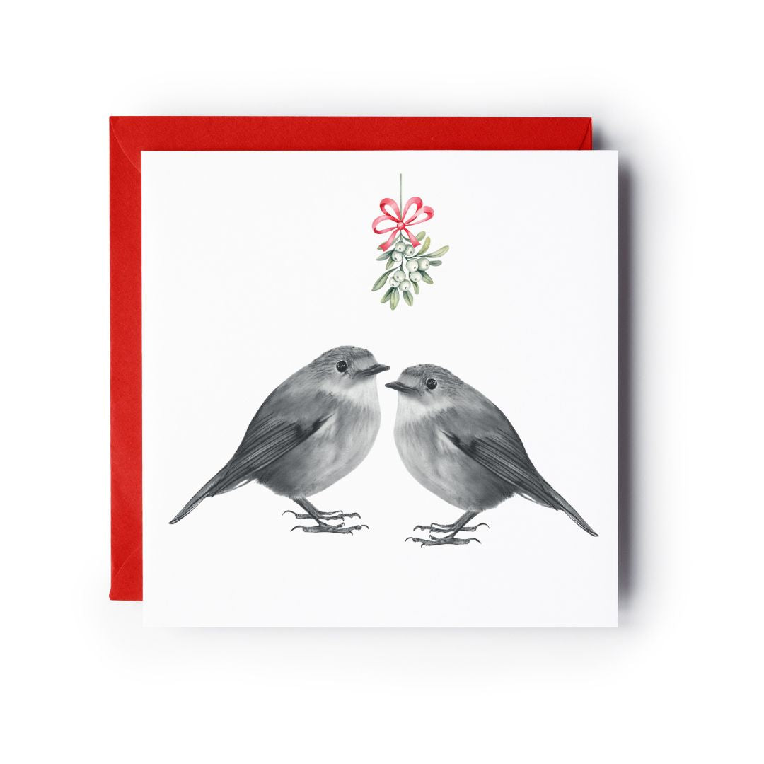 Charming robin mistletoe Christmas card with a sweet hand-drawn illustration.