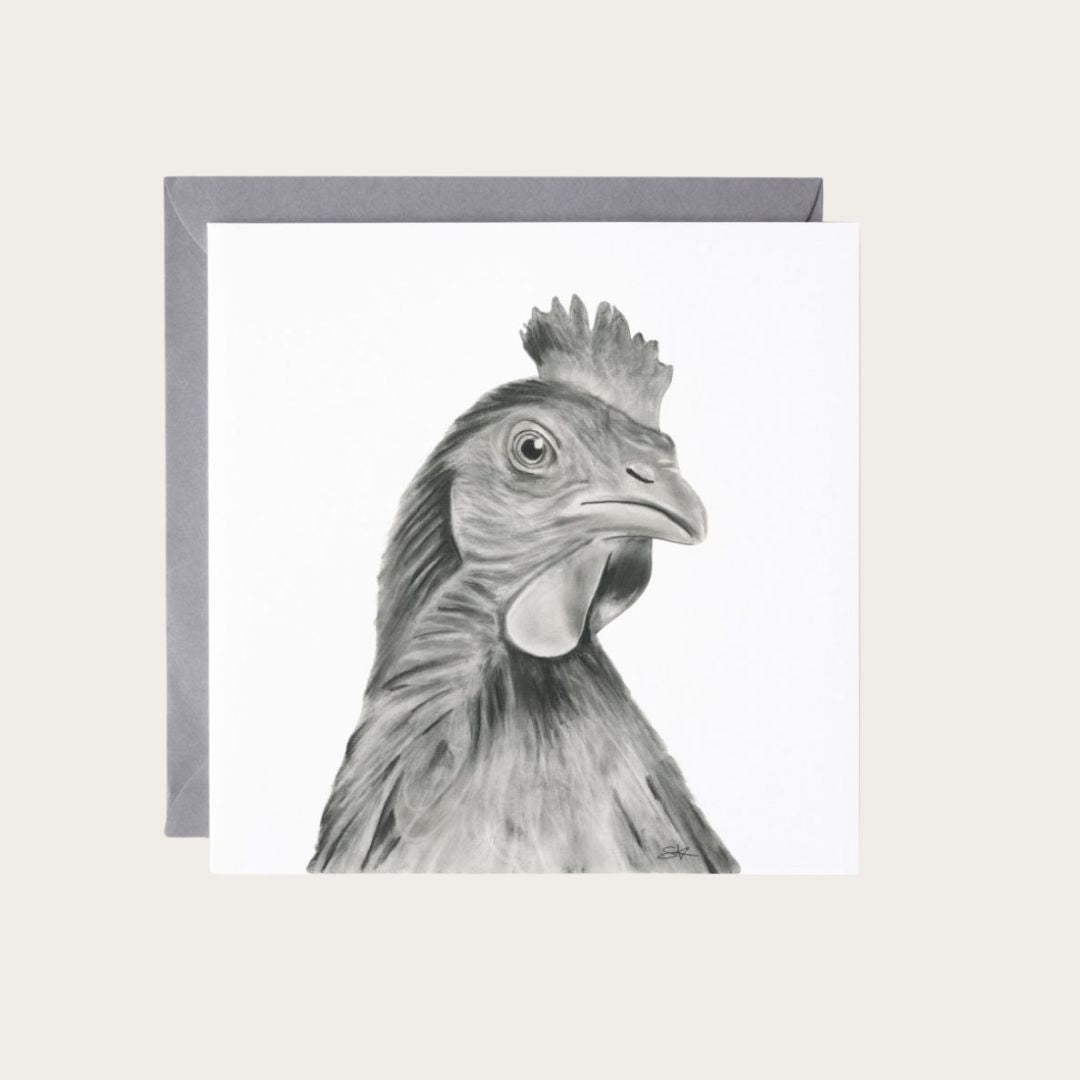 An exquisite greeting card showcasing a detailed illustration of Alpha the Cockerel, making it a unique choice for celebrating special occasions with rustic charm. Printed on premium, eco-conscious materials, it comes with a matching envelope. Find it at Libra Fine Arts.