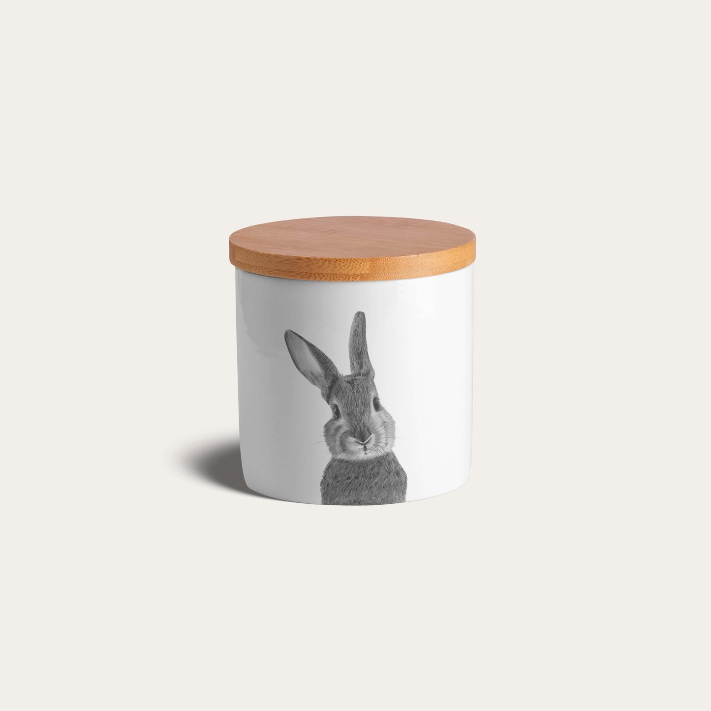 Adorable UK-made bone china jar with a delicate bunny design, ideal for tea, coffee, sugar, or biscuit storage.