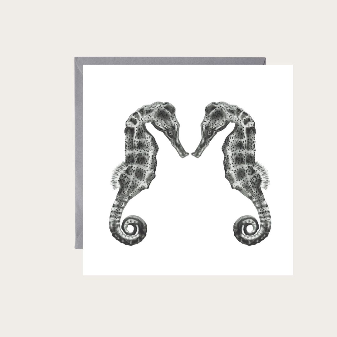 An exquisite hand-drawn greeting card showcasing Diya the seahorse and her companion, ideal for celebrating special occasions with marine life lovers.
