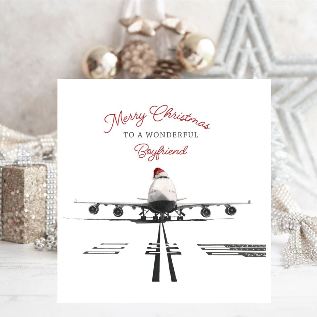A unique and beautiful hand-illustrated festive 747 aircraft Christmas card for your boyfriend, designed by Libra Fine Arts