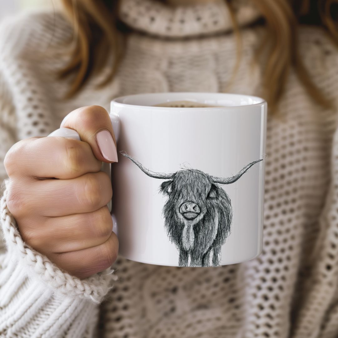 This beautiful Highland Cow Bone China Mug showcases a detailed hand-illustrated design of the iconic Highland cow. Made from fine bone china, this elegant mug is perfect for animal lovers, nature enthusiasts, and anyone who appreciates the rustic charm of country life