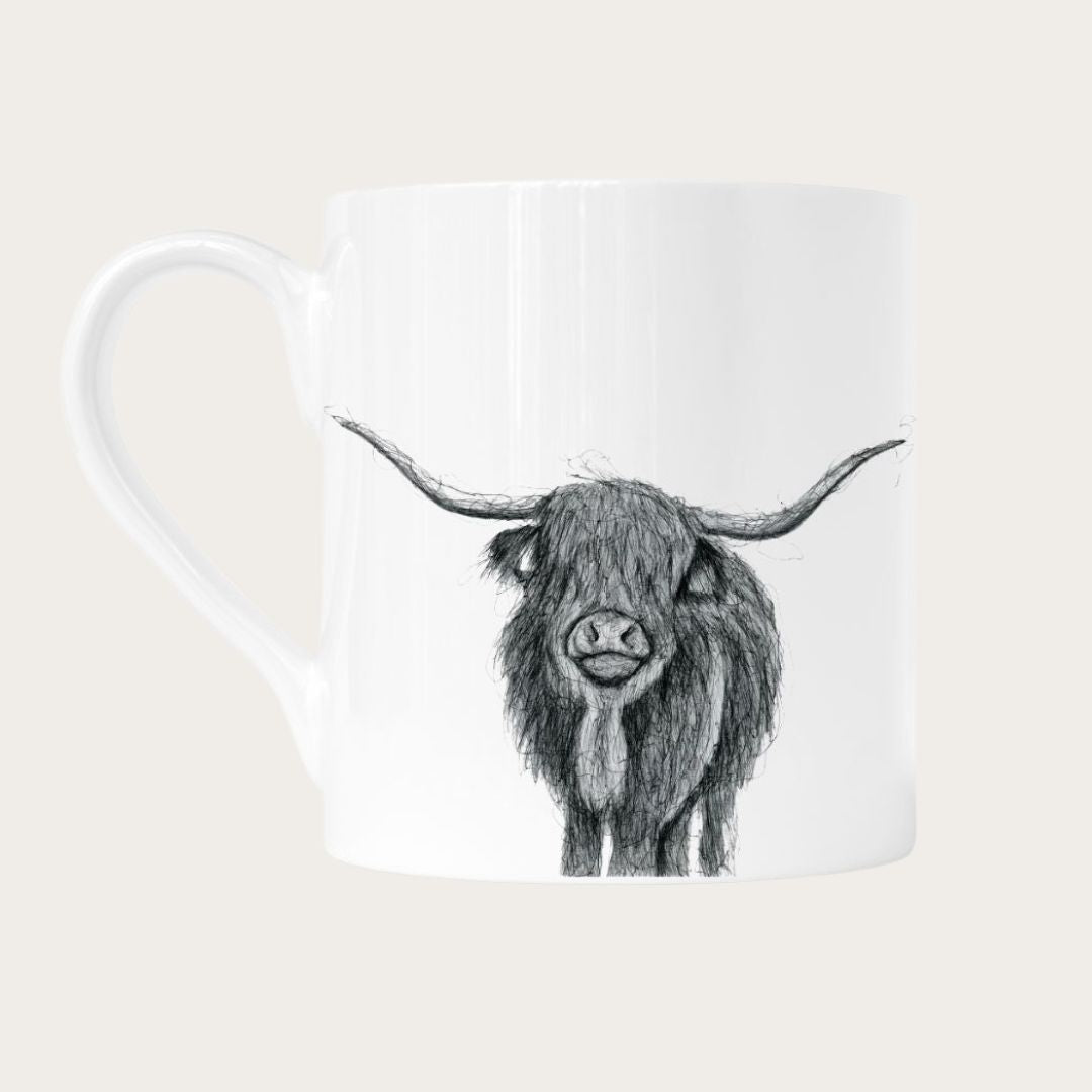 Celebrate the majestic Highland cow with this premium bone china mug. Featuring a stunning hand-drawn illustration of the Highland cow, this mug combines elegance and rustic beauty, making it a perfect addition to your kitchen or a thoughtful gift for those who adore country life and nature