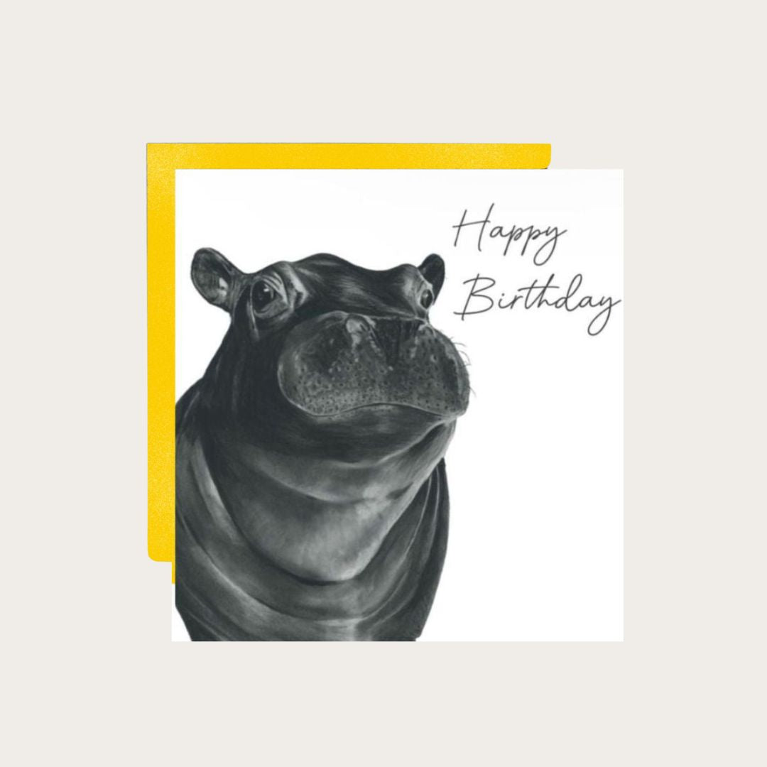 Celebrate with a playful touch of nature with this whimsical birthday card featuring a happy hippo
