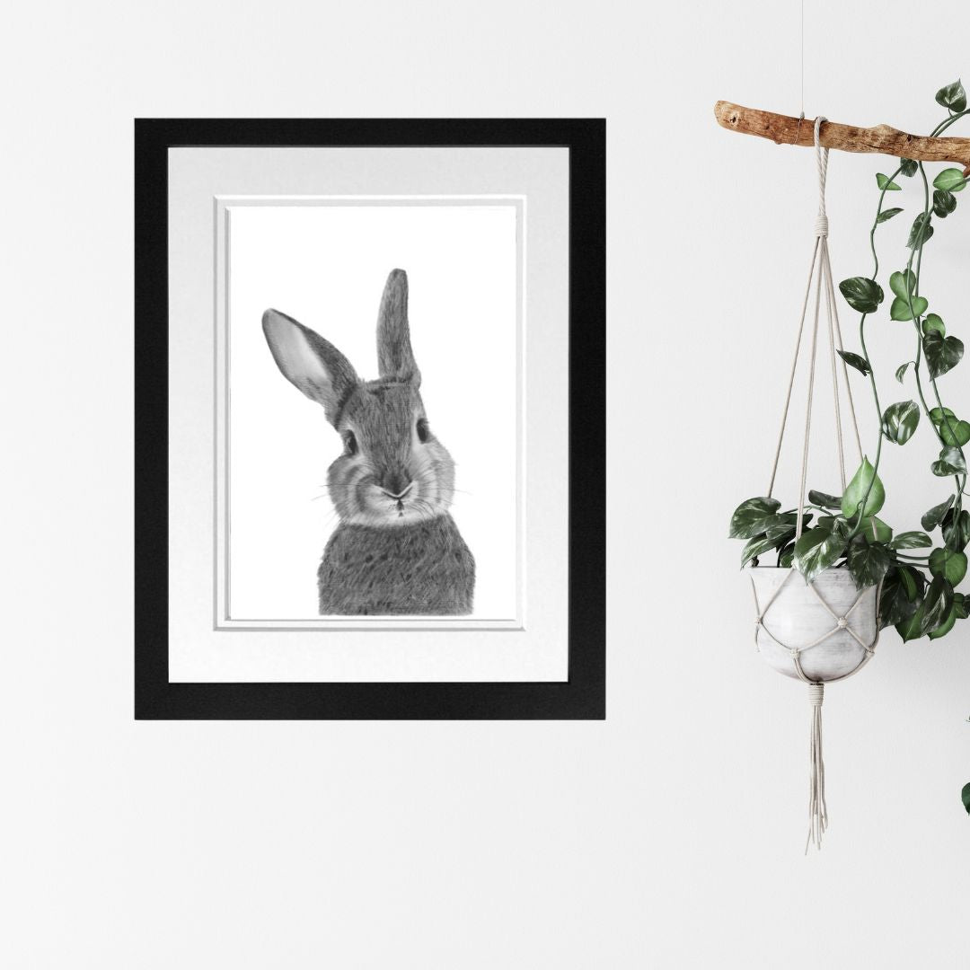 Libra_Fine_Arts_Hand_Drawn_Bunny Drawing_in_oak_Frame on the hallway table. _._A_beautiful_gift_for_bunny_lovers for birthday presents or christmas gifts.