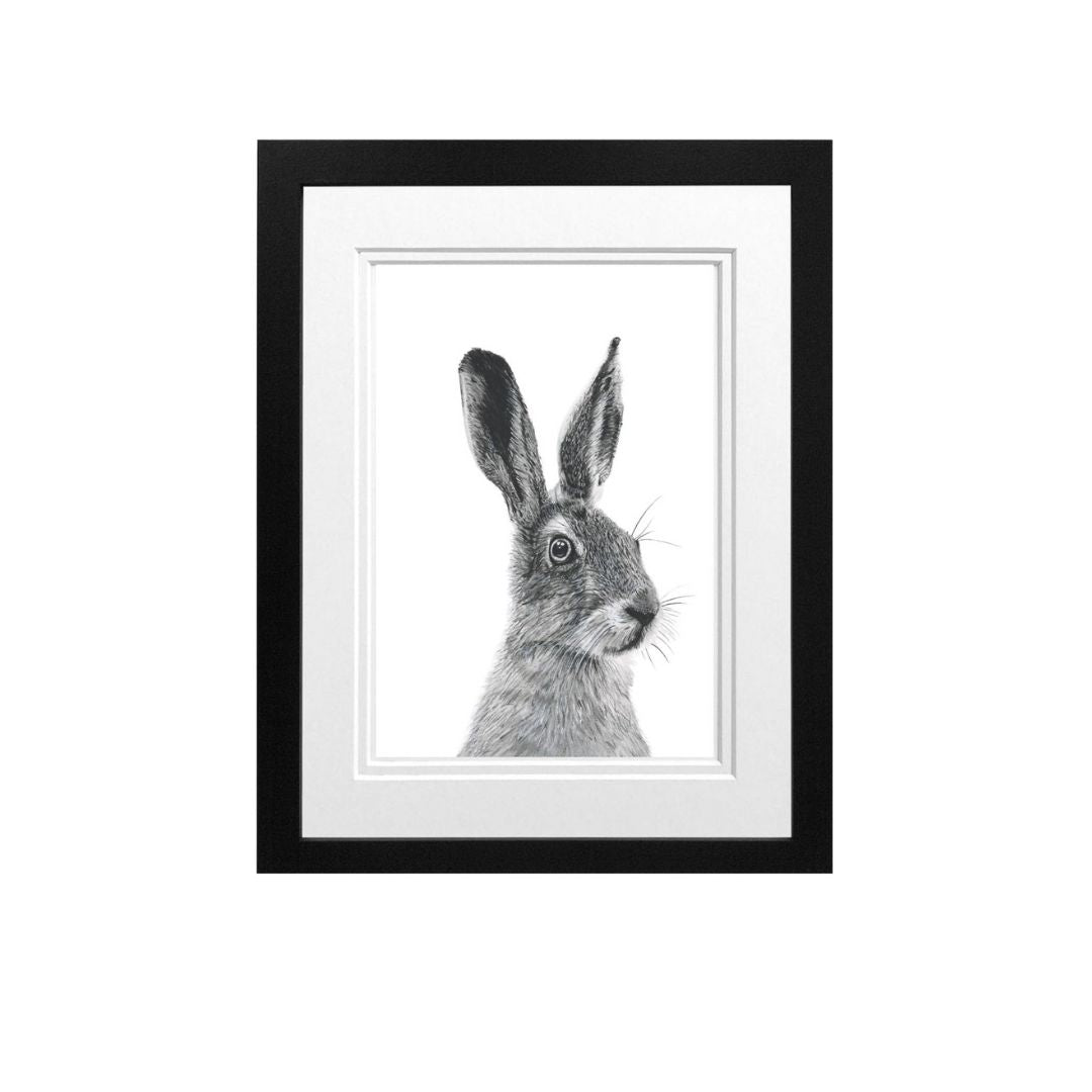 Hand-drawn Hare fine art print in a black frame, featuring intricate details of the hare's graceful form, perfect for gifting.