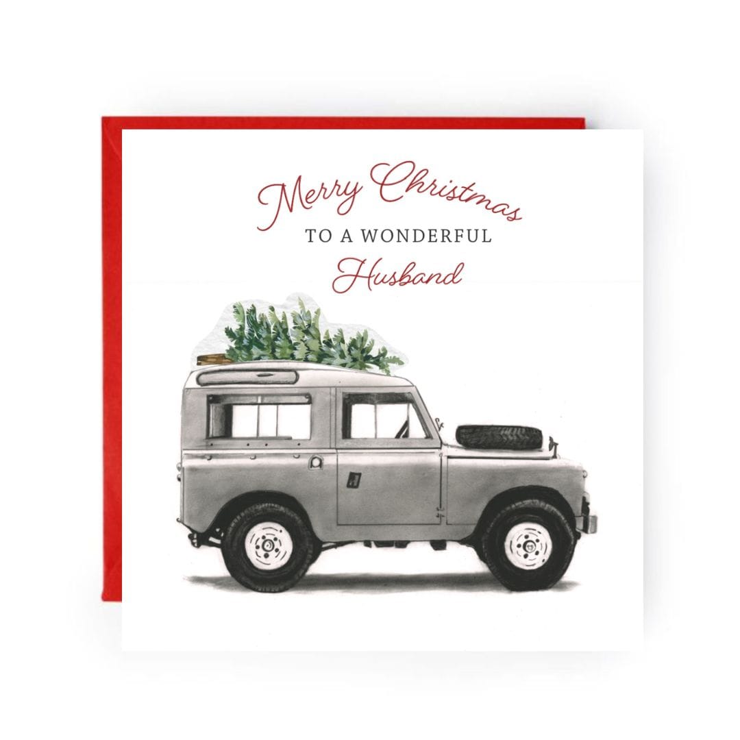 Send your husband warm Christmas wishes with this classic Land Rover Christmas card, featuring a hand-drawn design by Libra Fine Arts. A perfect blend of vintage charm and festive cheer