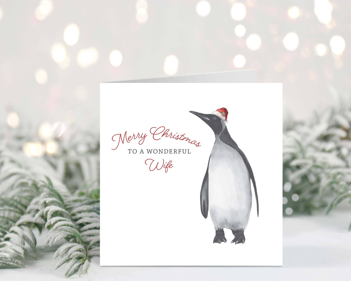 Charming festive penguin Christmas card for a wonderful wife, beautifully hand-drawn by Libra Fine Arts.