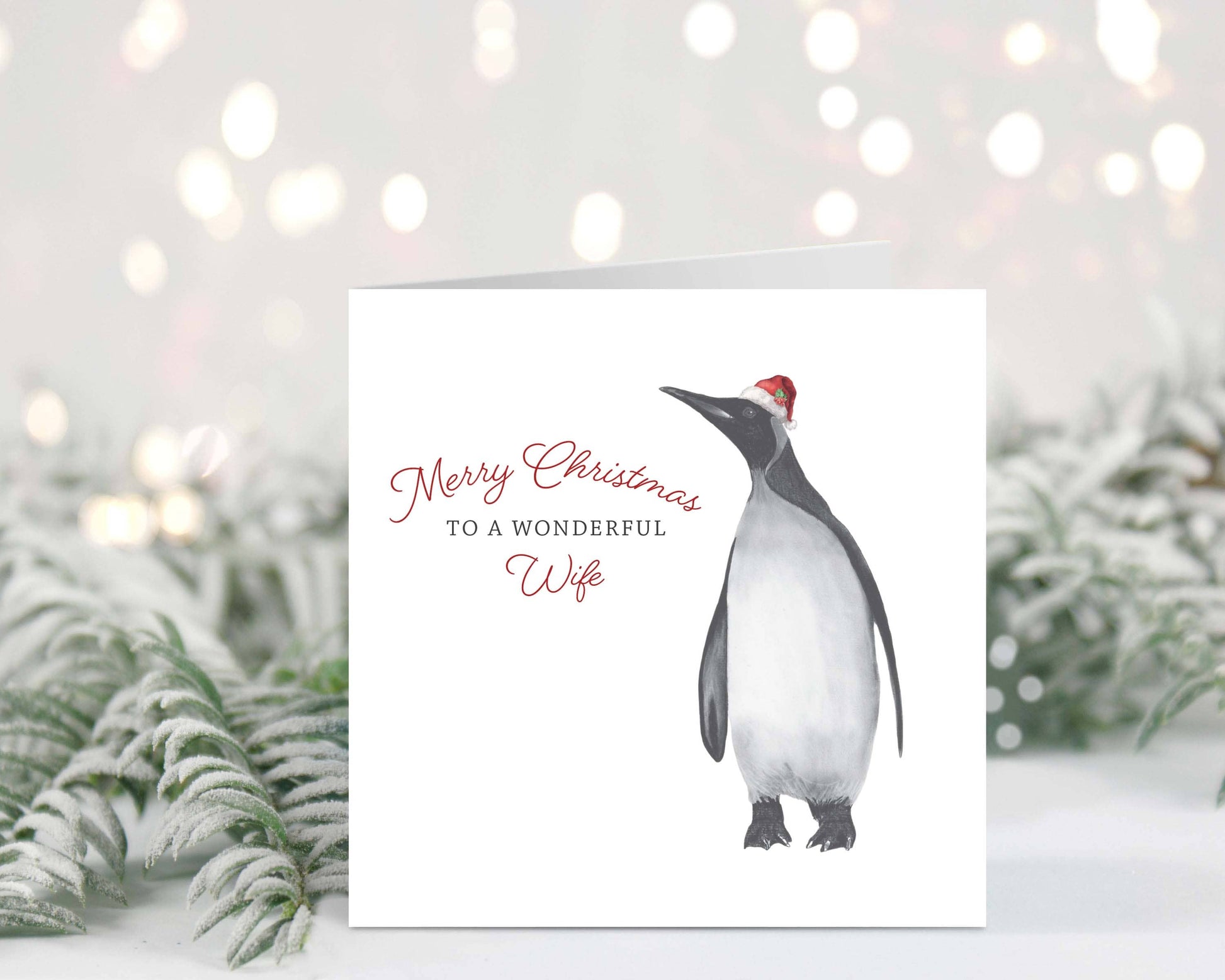 Charming festive penguin Christmas card for a wonderful wife, beautifully hand-drawn by Libra Fine Arts.