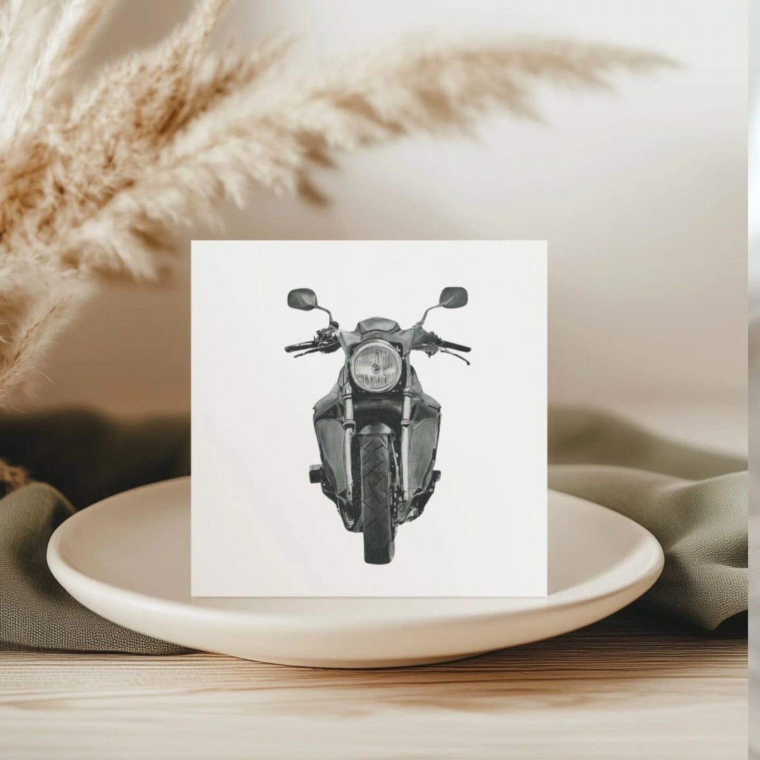 This motorbike greeting card features a beautifully hand-drawn illustration of a classic motorcycle, making it a perfect choice for motorcycle enthusiasts. Ideal for birthdays, special occasions, or as a unique gift for bikers, this card captures the spirit of the open road.