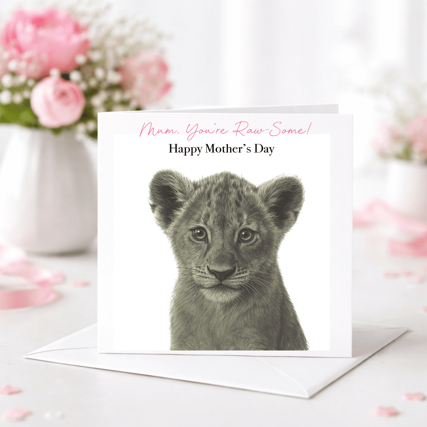Mother's Day card with a lion cub and flowers in the background