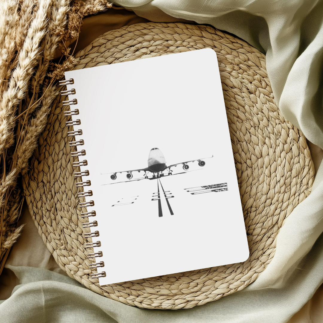 Aviation art notebook with hand-drawn Boeing 747, fine line aircraft illustration on lined pages, ideal gift for pilots, travelers, and aviation fans.